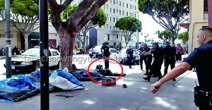 洛杉矶壮汉抗议者拳打警察事件解析